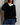 zuri reverse fleece vneck raglan sweatshirt | true black-Sea Biscuit Del Mar