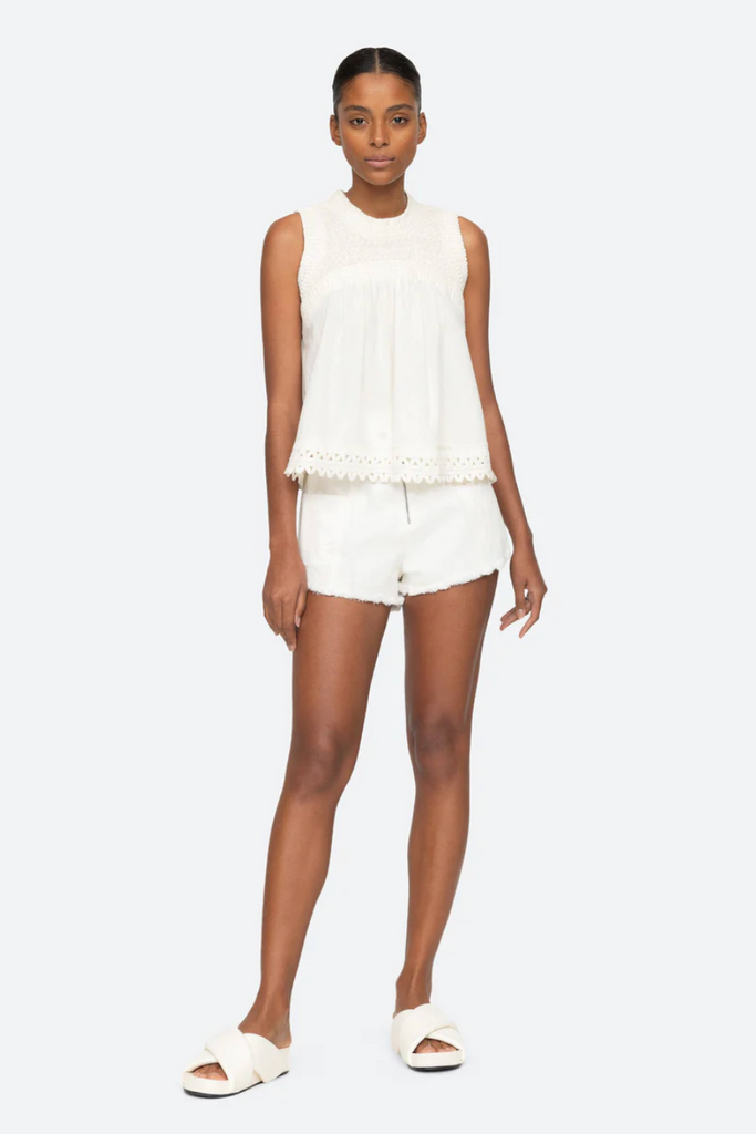 https://shopseabiscuit.com/cdn/shop/products/Willa-Smocked-Tank-Top-White-5_1024x1024.png?v=1674409166